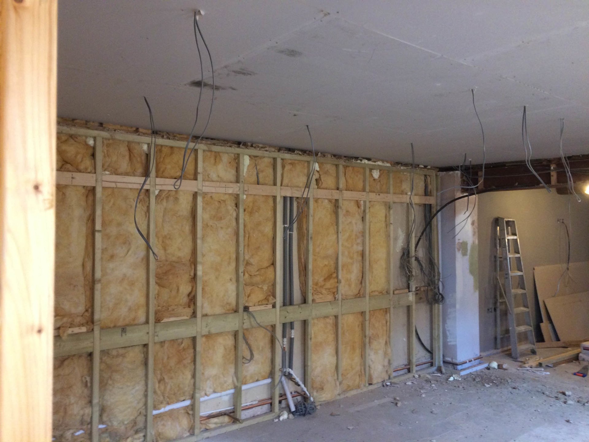 Insulated stud wall at first fix